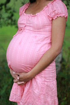 Pregnant woman in Pink